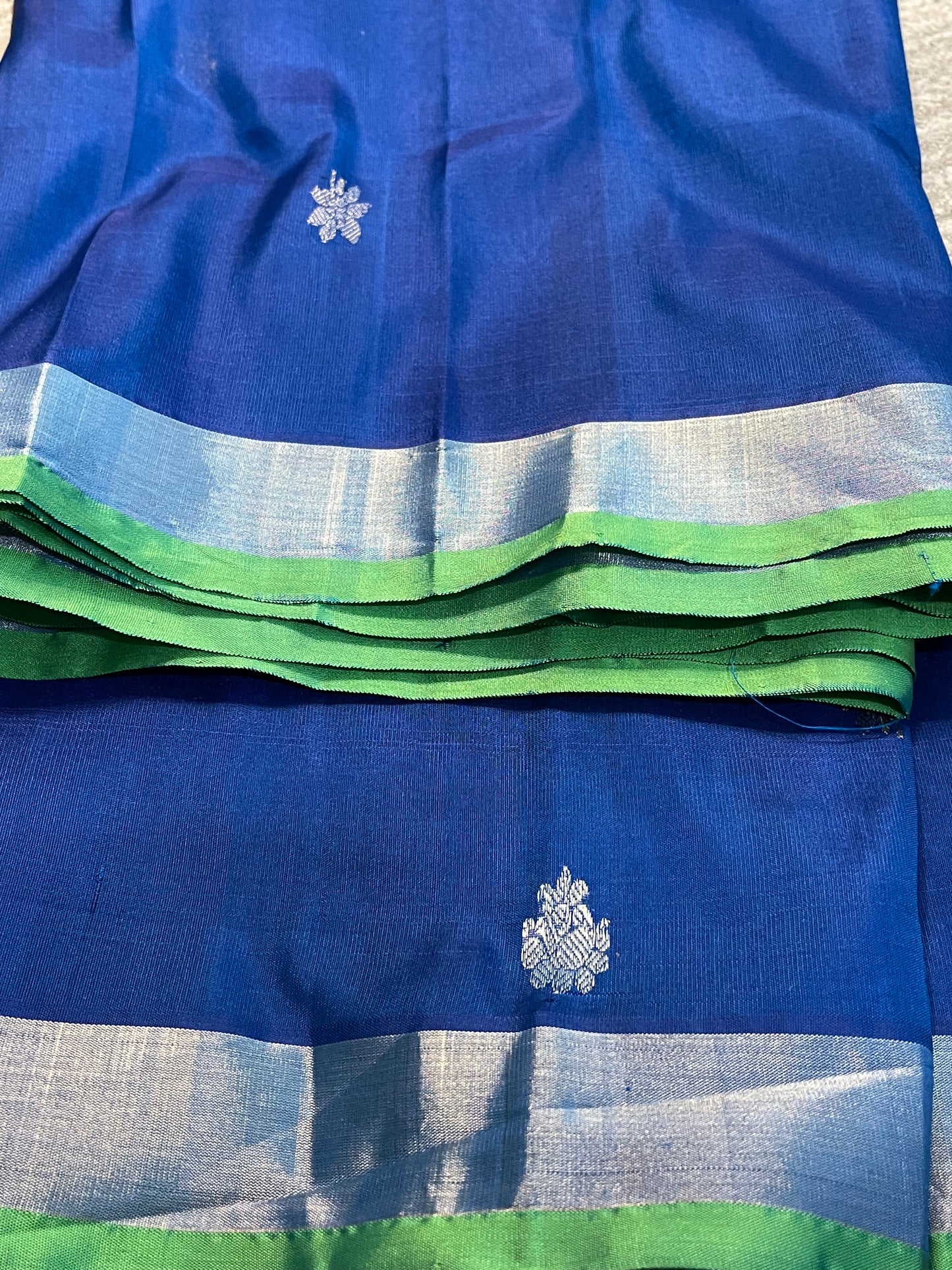 Elegant Teal Blue Saree with Parrot Green Selvedge and Self Zari