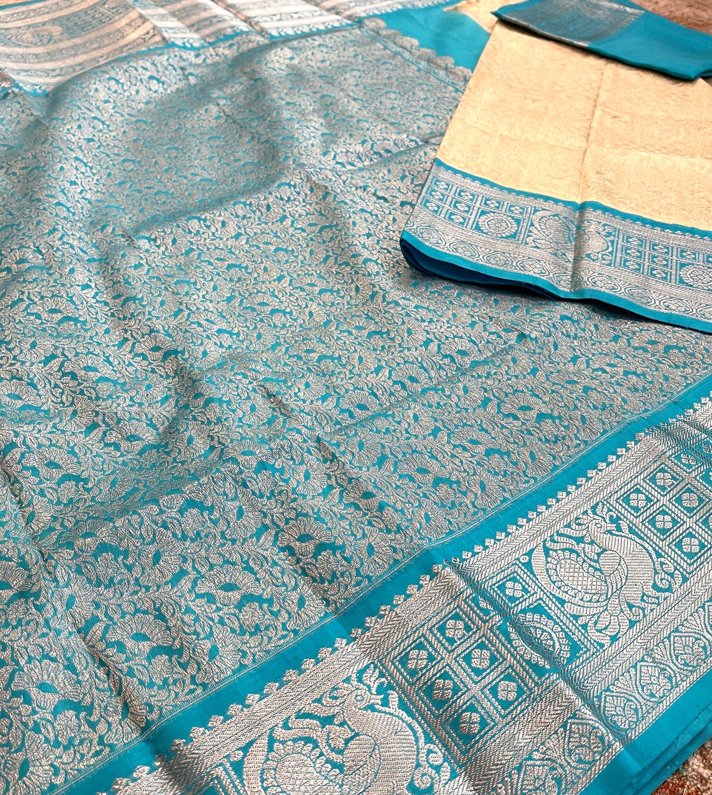 Elegant Cream Saree with Sea Blue and Silver Zari Border