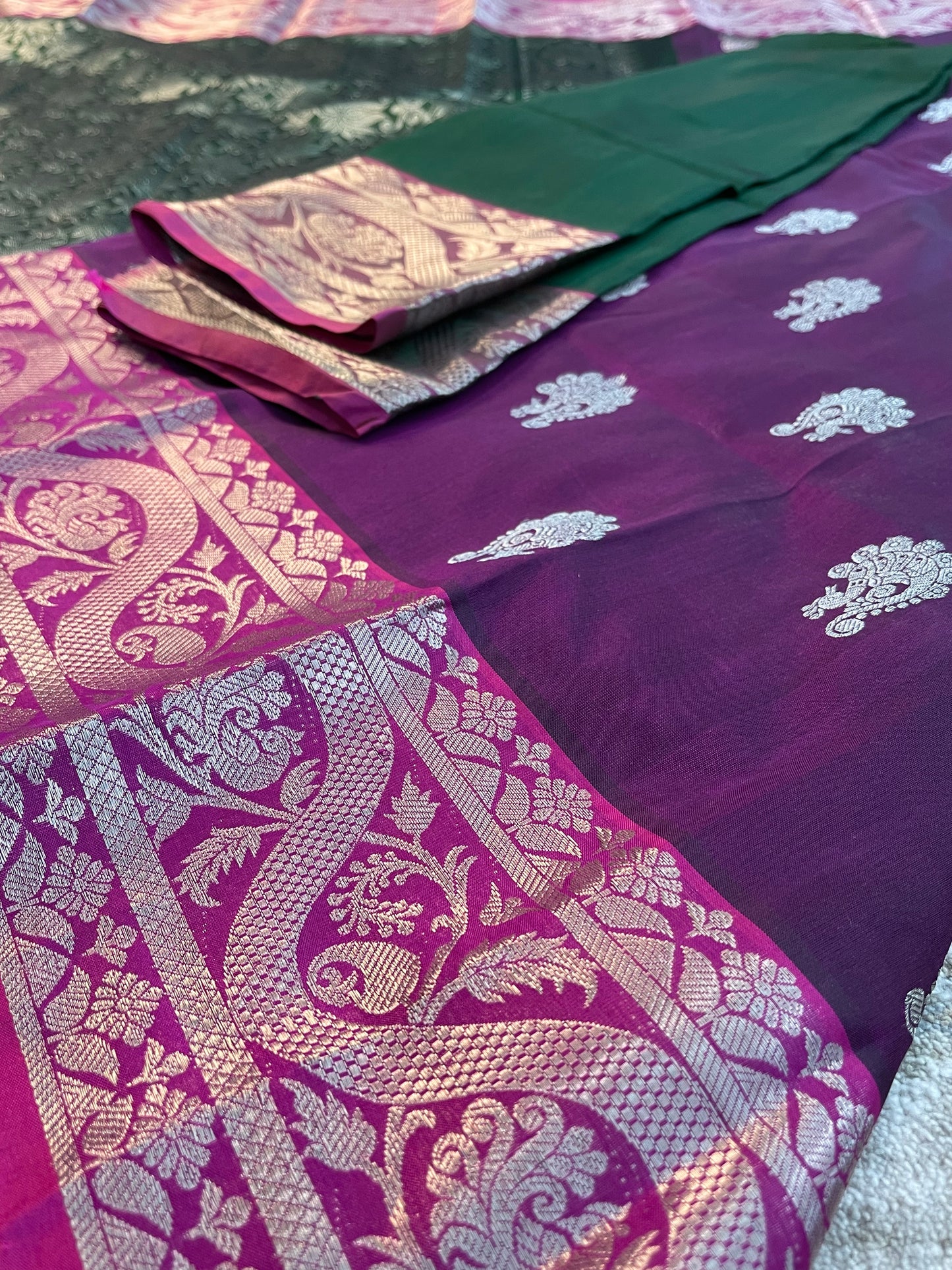 Elegant Dark Purple Silk Saree with Green Borders and Zari Motifs