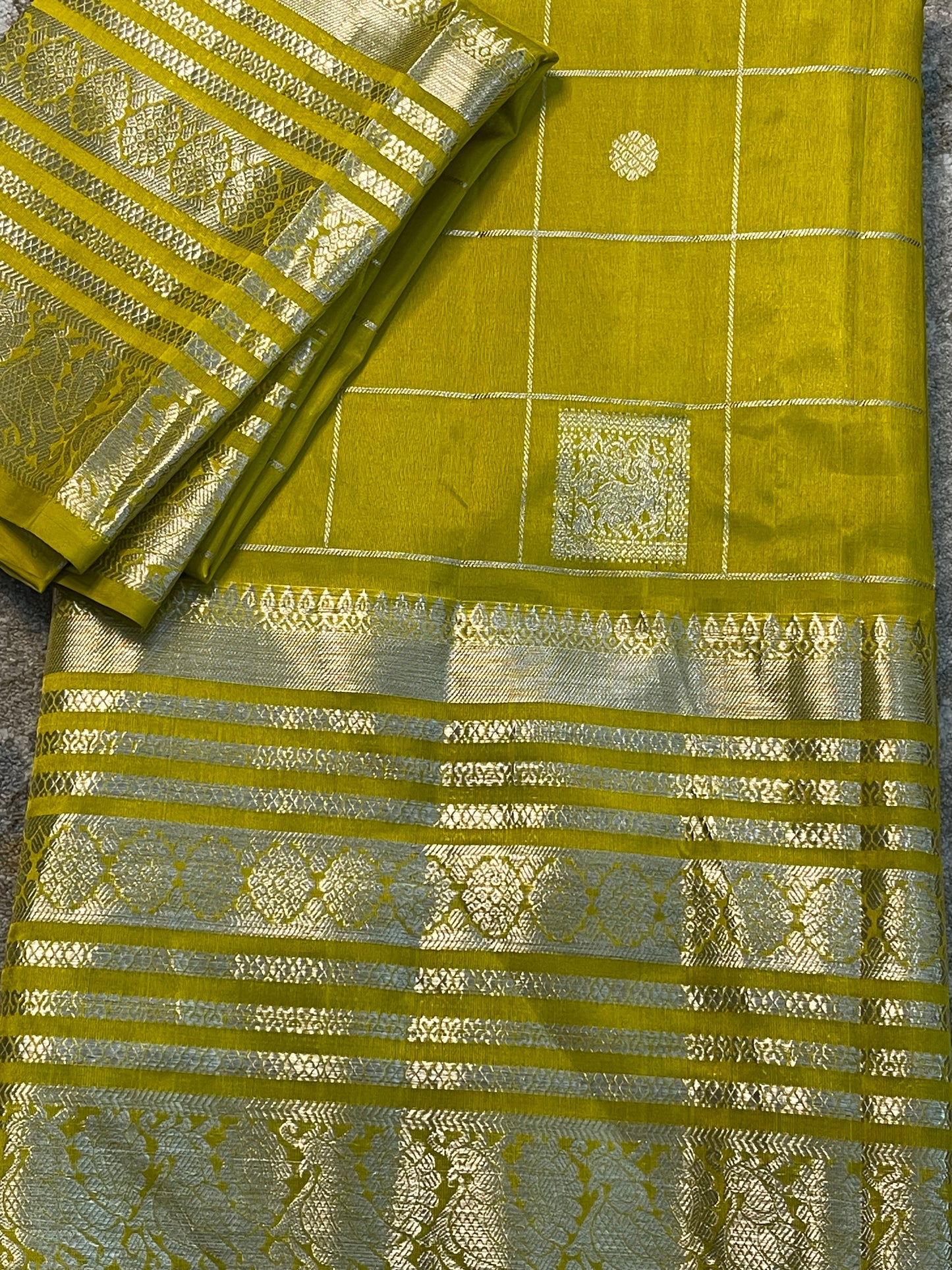 Unique Mehendi Green Silk Saree with Silver Zari Border and Checks