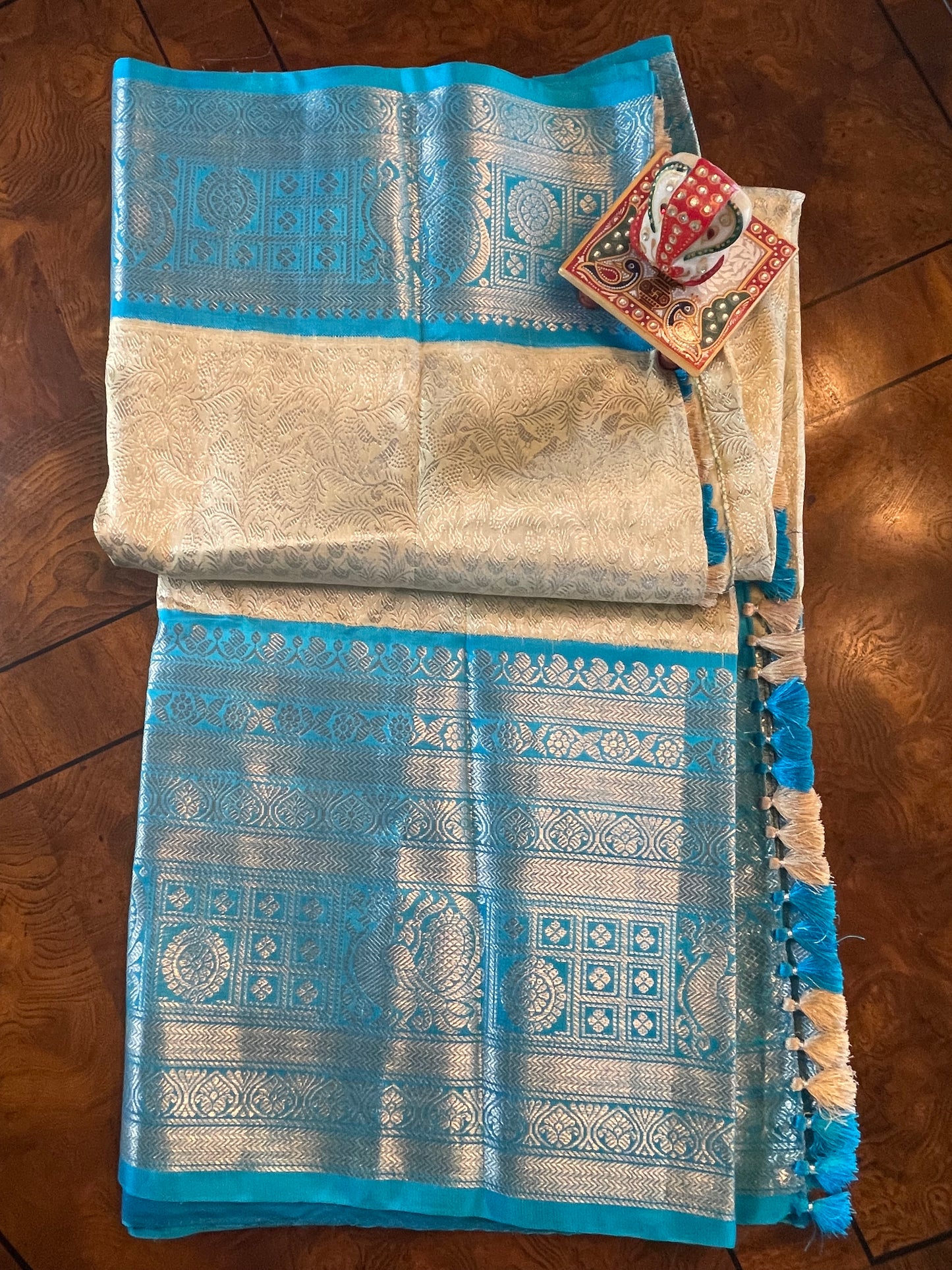 Elegant Cream Saree with Sea Blue and Silver Zari Border