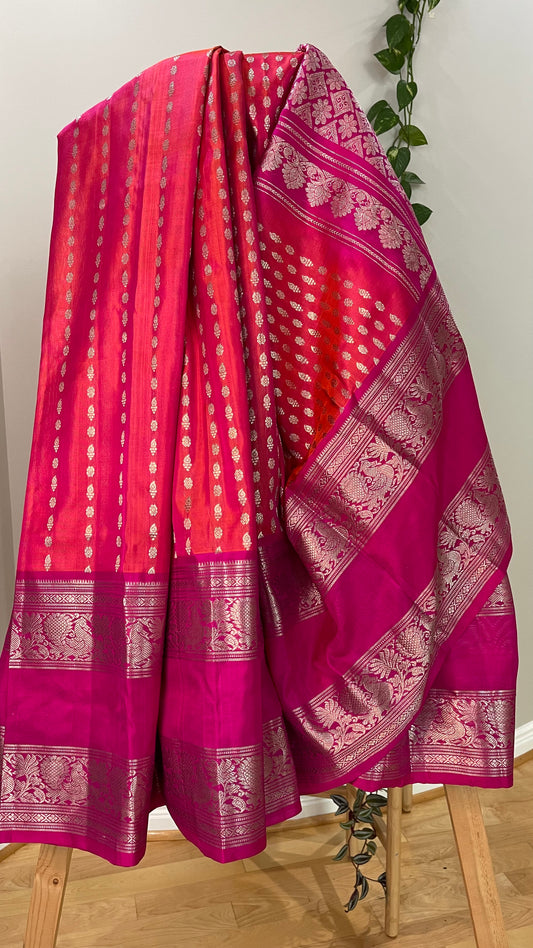 Elegant Peach Silk Saree with Silver Zari on Pink Border