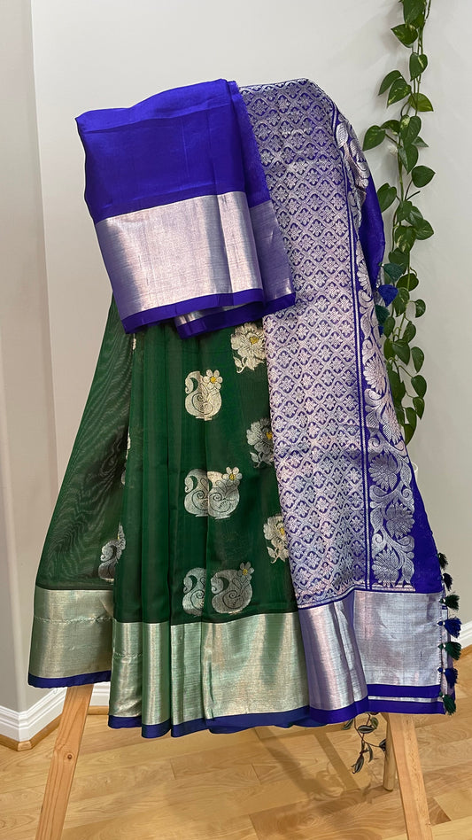 Elegant Dark Green Silk Saree with Blue Borders and Zari Motifs