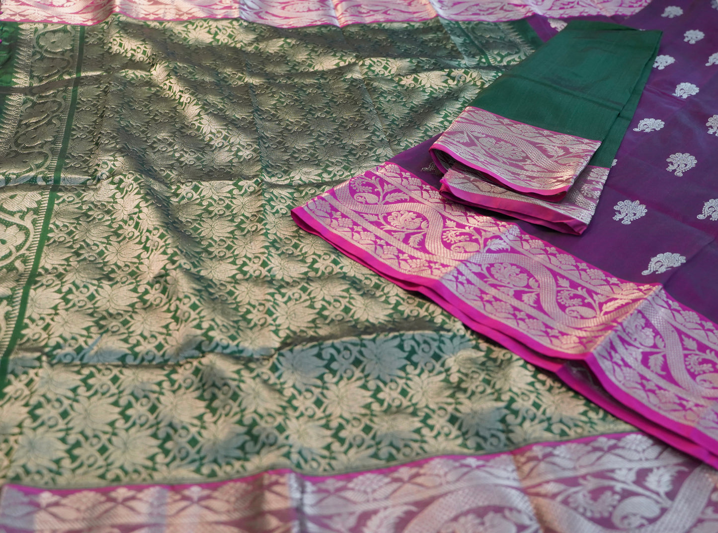 Elegant Dark Purple Silk Saree with Green Borders and Zari Motifs